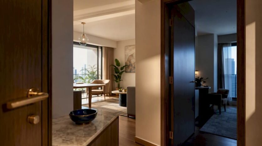 Shared foyer leading to dual-key condo spaces